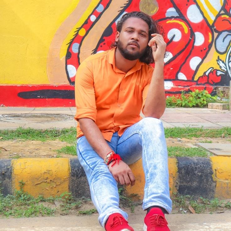 Kaveri Mehta, Lead Design Curator at Canvas Grove Harbor, reviewing corporate floral arrangements